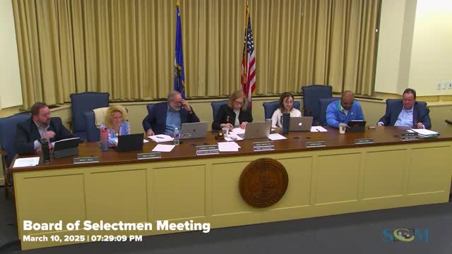 Joan Coe addresses AARP funding and corrections during town meeting