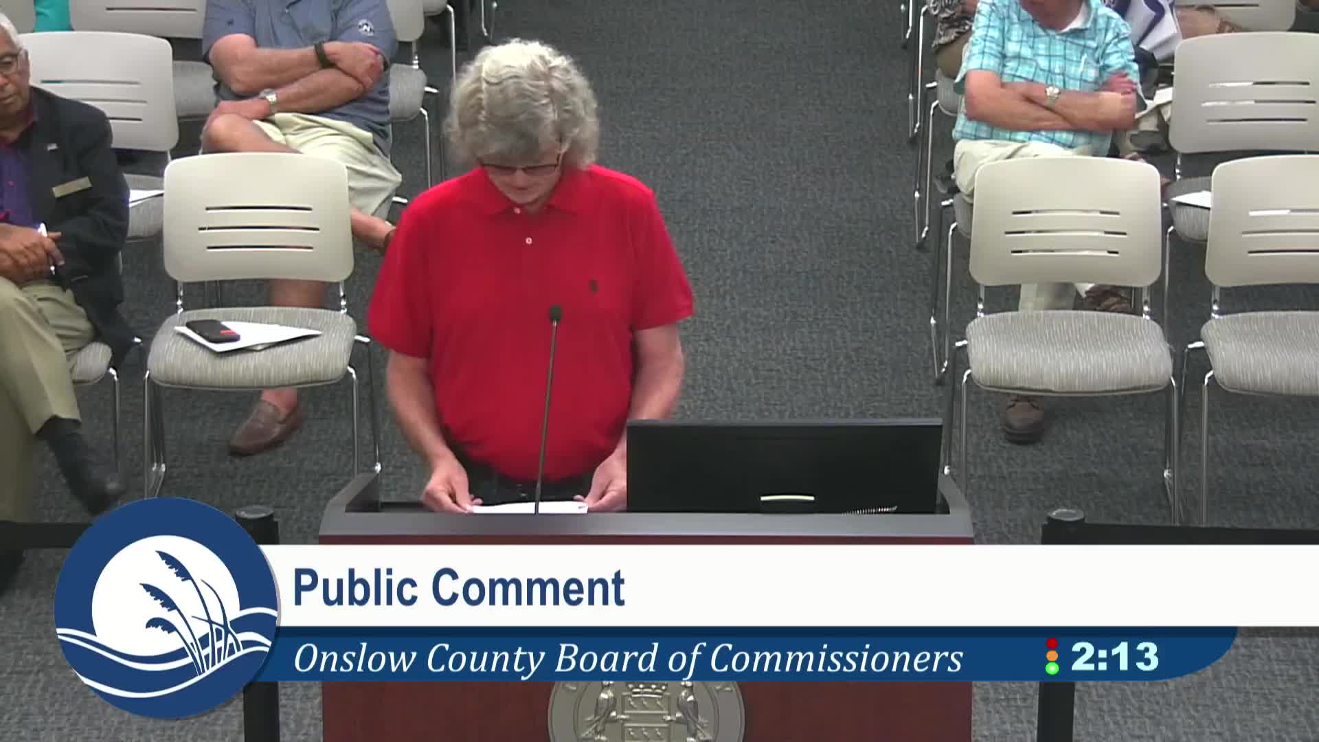Julie Sewell addresses Onslow County commissioners on EMS transport delays for deceased